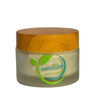 Earthleaf Aloe Ferox Day Cream packaging. A natural setting evokes calm and sustainable living for this South African skincare product.